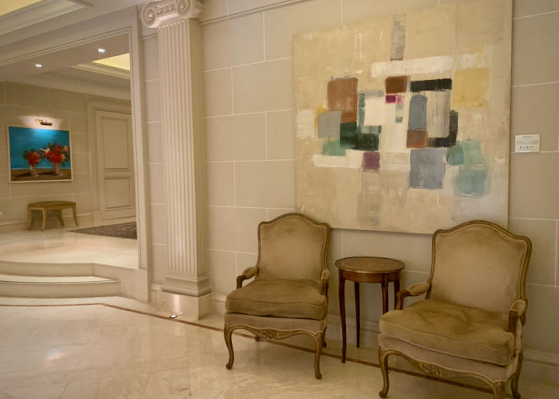 Hotel lobby with contemporary art on the walls.