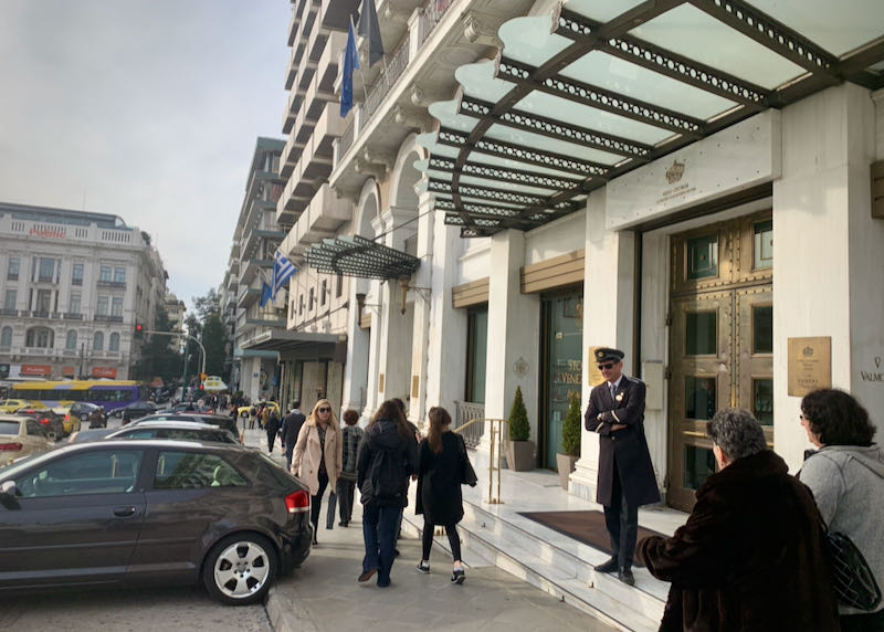 Doorman standing outside of the King George Hotel in Athens