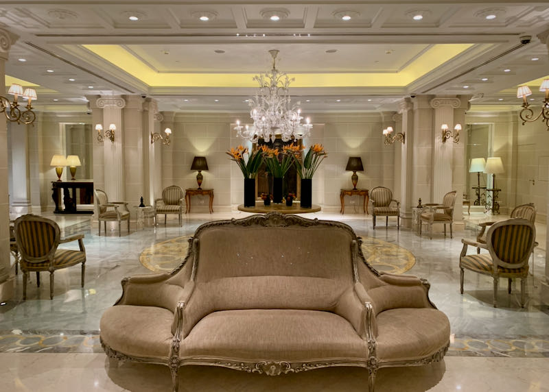 Marble hotel lobby with fresh gladiolas
