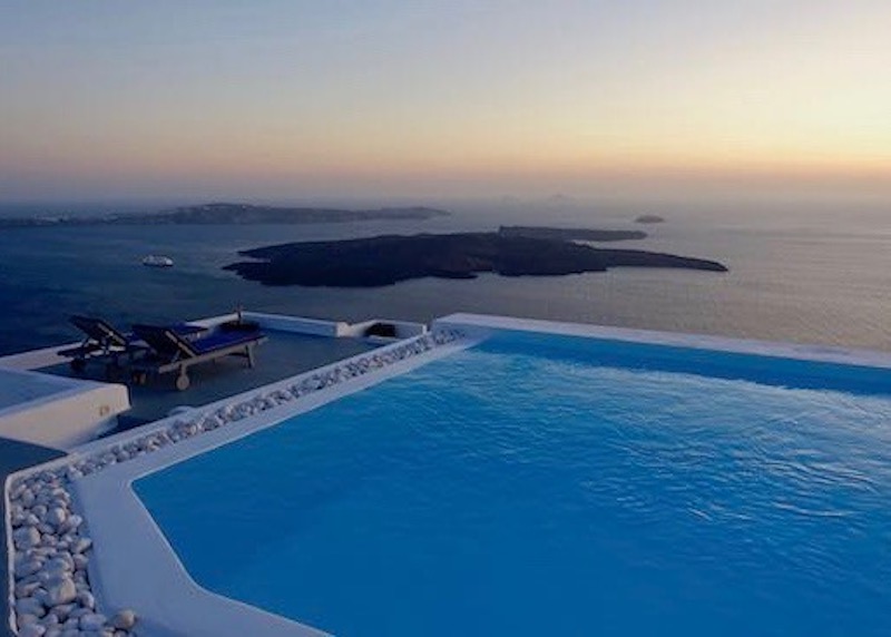 The pool with volcano view at Altana Heritage Suites in Imerovigli, Santorini