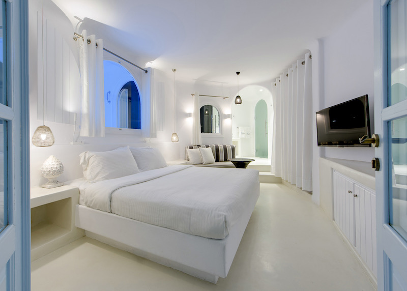 Bedroom of a Honeymoon Pool Suite at Dana Villas and Infinity Suites.