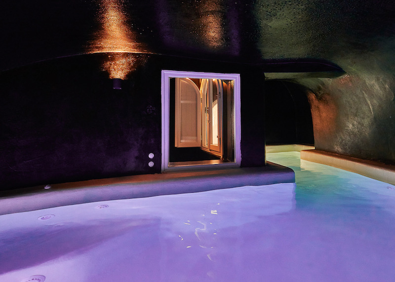 Mood lighting in the indoor river cave plunge pool of the Master Pool Villa
