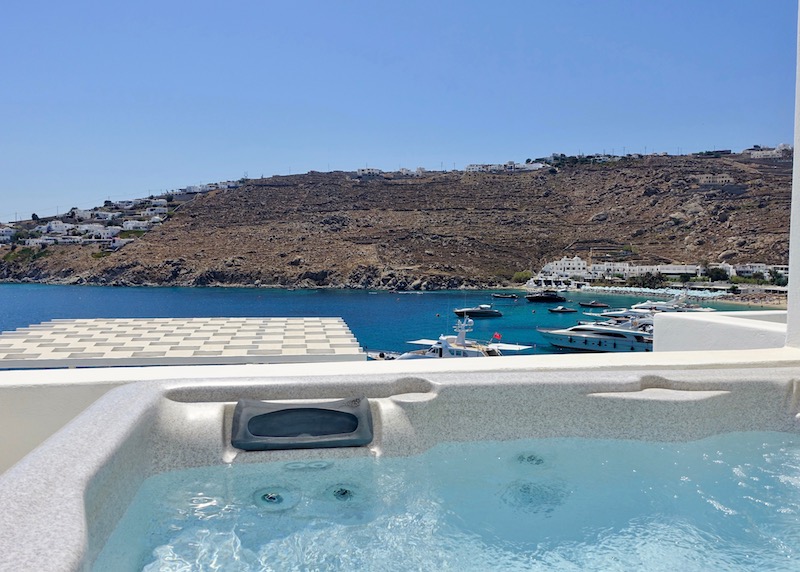 Jacuzzi and bay view from the VIP Suite at Nissaki, Mykonos