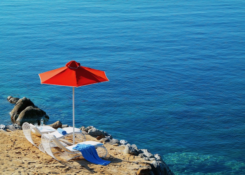Petasos Beach Resort private beach area in Mykonos