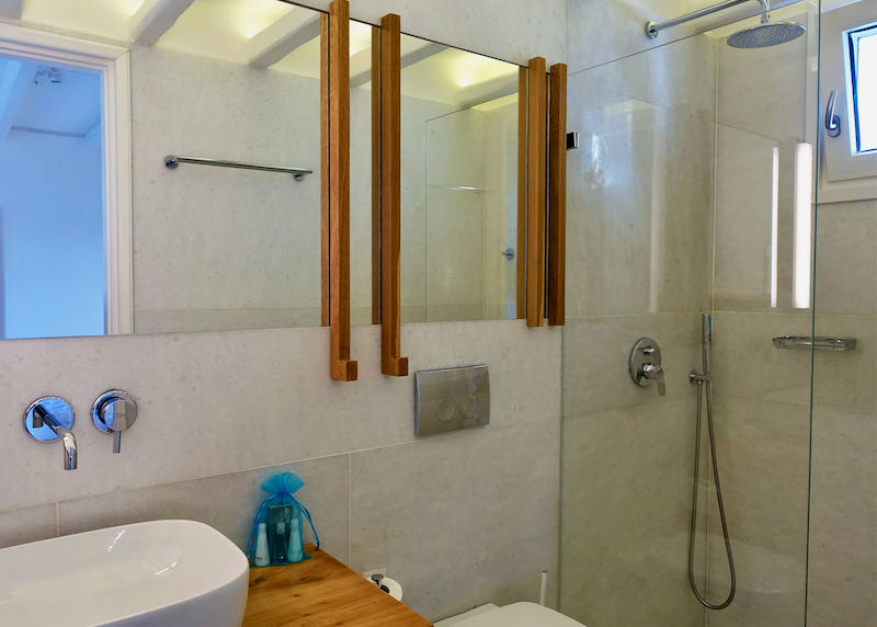 Marble bathroom with walk-in shower