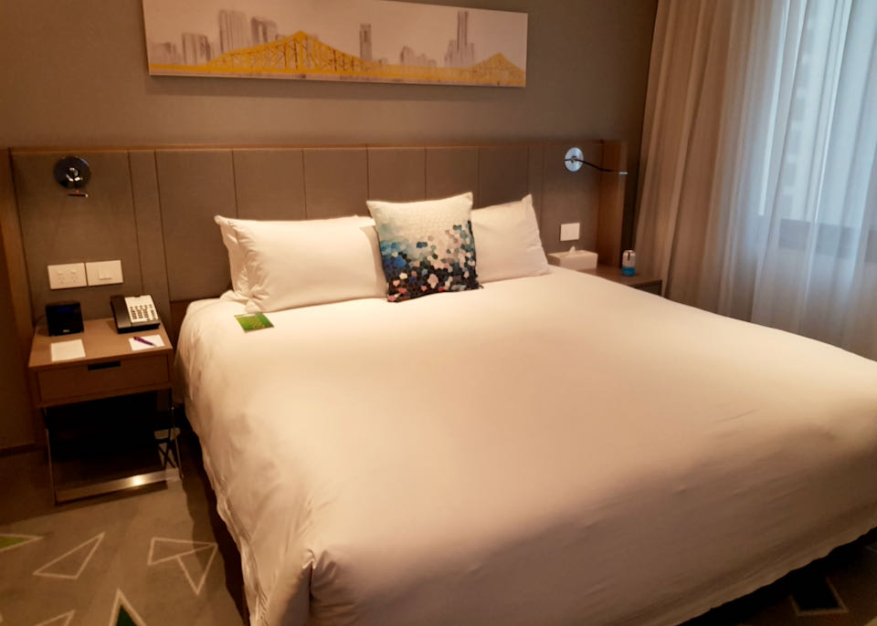 The compact rooms feature Brisbane-themed artwork.