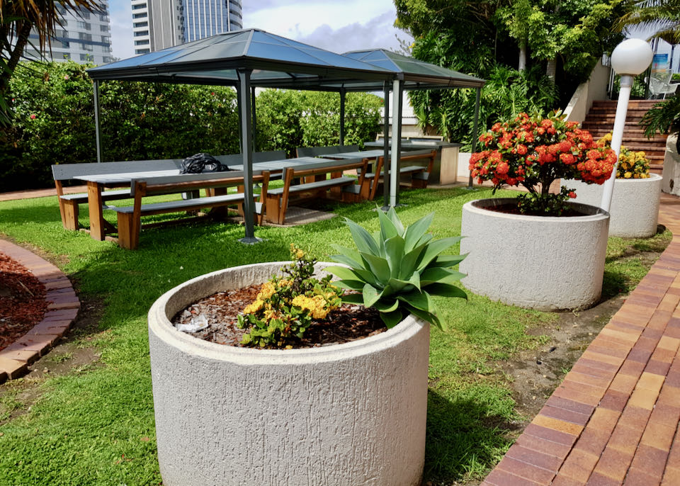 The Novotel has beautiful gardens with barbecues.