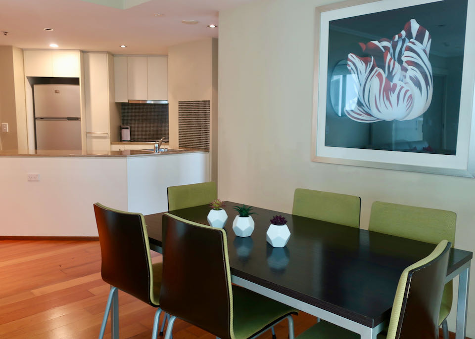 Apartments come with dining tables and kitchens.