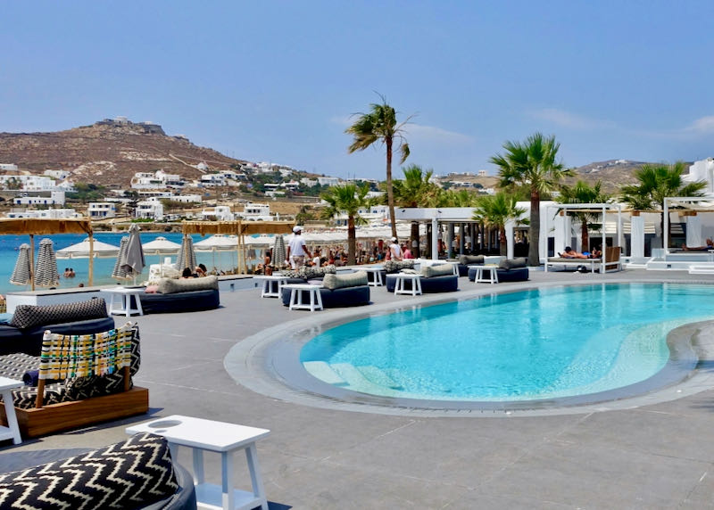 The pool, deck and private beach area at Mekonos Blanc hotel in Ornos, Mykonos.