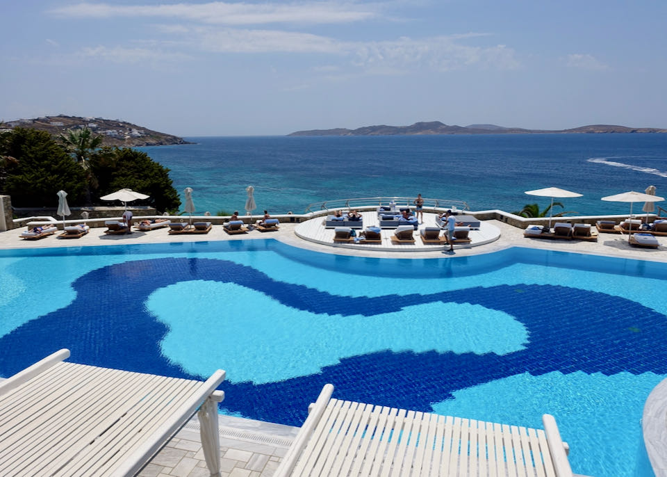 Pool and terrace at Mykonos Grand Hotel in Agios Ioannis Beach