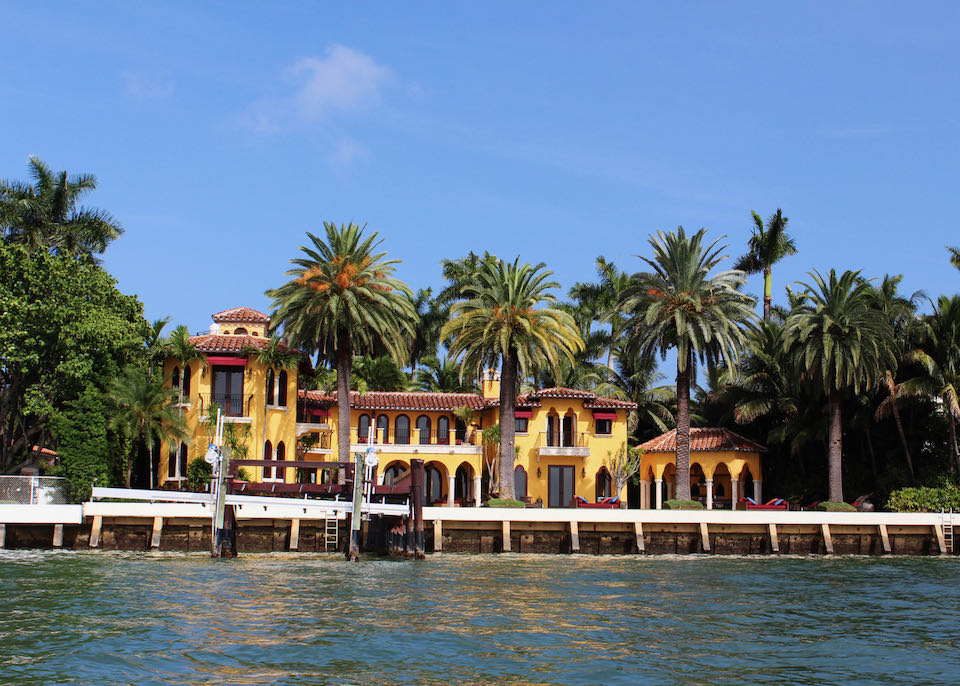 Large, hacienda-style villa on Star Island in Miami, as seen from the water