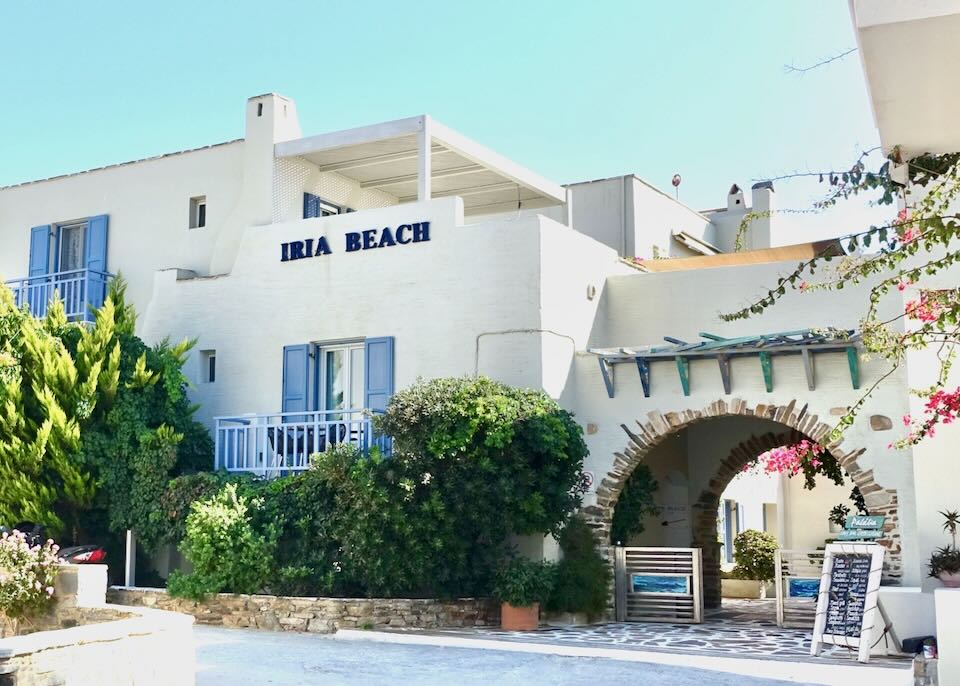 White, boxy exterior of Iria Beach Art Hotel