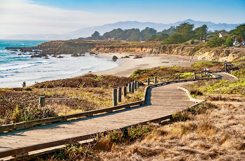 Winding boardwalk behind Moonstone Beach in Cambria, Big Sur, California