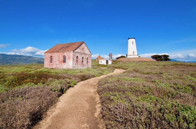 Piedras Blancas Lighthouse and the fog signal building in the San Simeon area of Big Sur, California