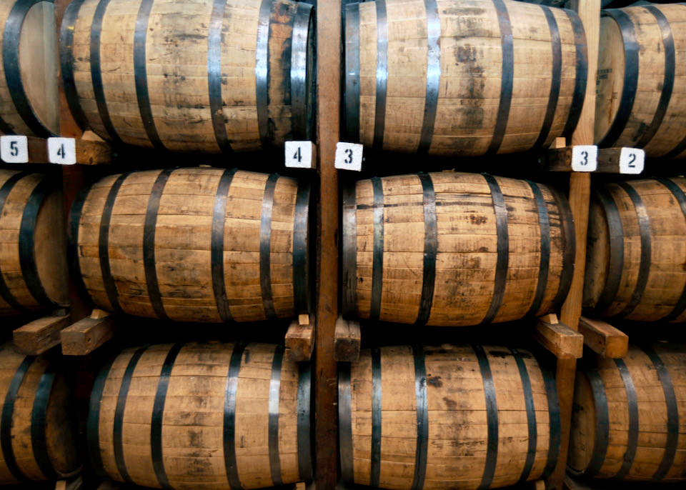 Barrels stacked in a bourbon distillery