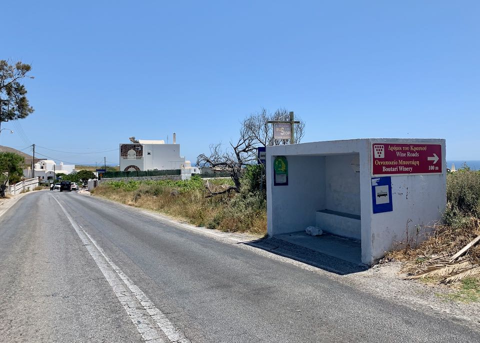 Bus stop near Santorini wineries.
