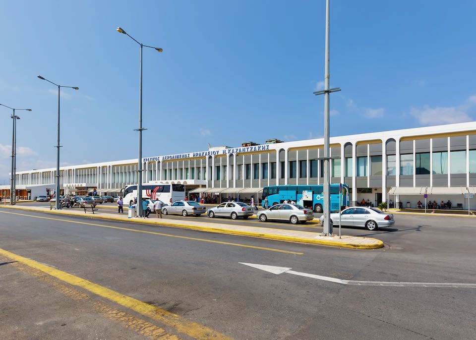 Rental cars at the Heraklion airport terminal.