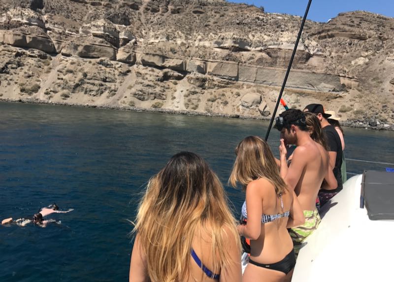 Private boat tour of Santorini caldera.
