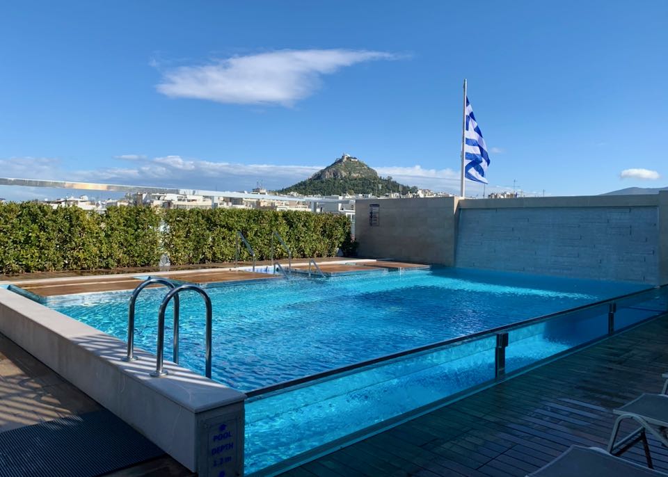 Hotel with pool and view in Plaka, Athens.