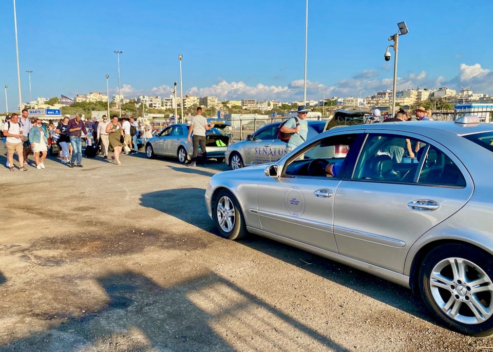 Taxis waiting for Heraklion ferry.