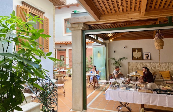 Breakfast in the courtyard of Veneziano Boutique Hotel in Heraklion, Crete