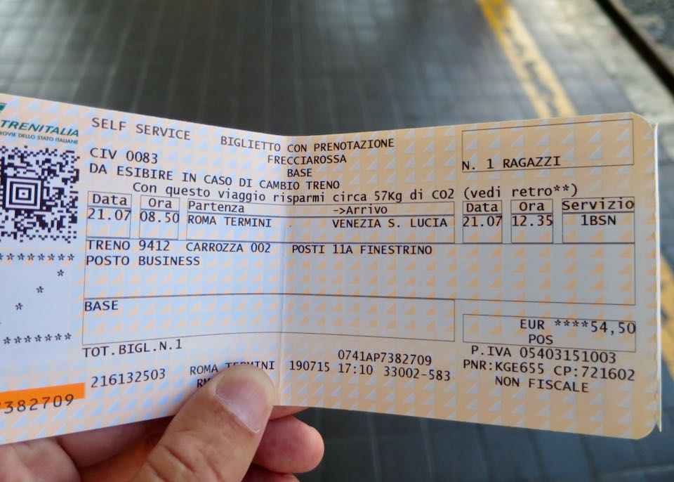 Italy train ticket showing arrival, departure, time, and price.