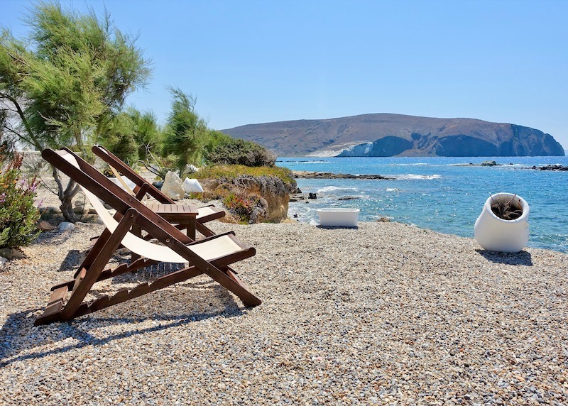 Beach with lounge chairs at Tania Milos