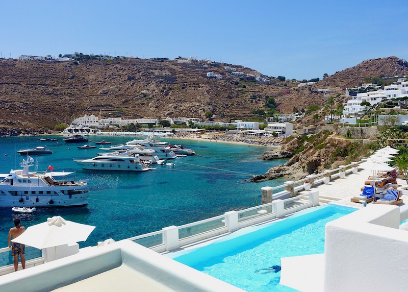 View to Psarou Beach from a pool at Nissaki Boutique Hotel in Platis Gialos, Mykonos