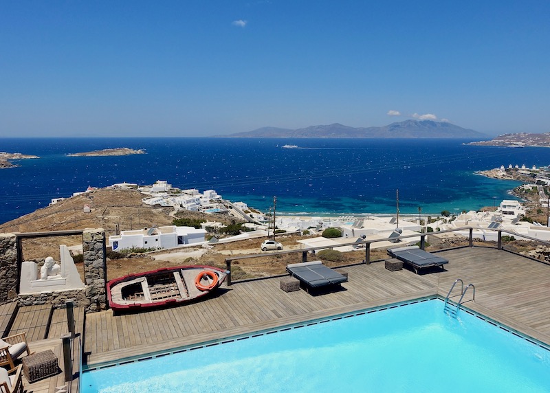 The pool and view from Tharroe of Mykonos in Megali Ammos