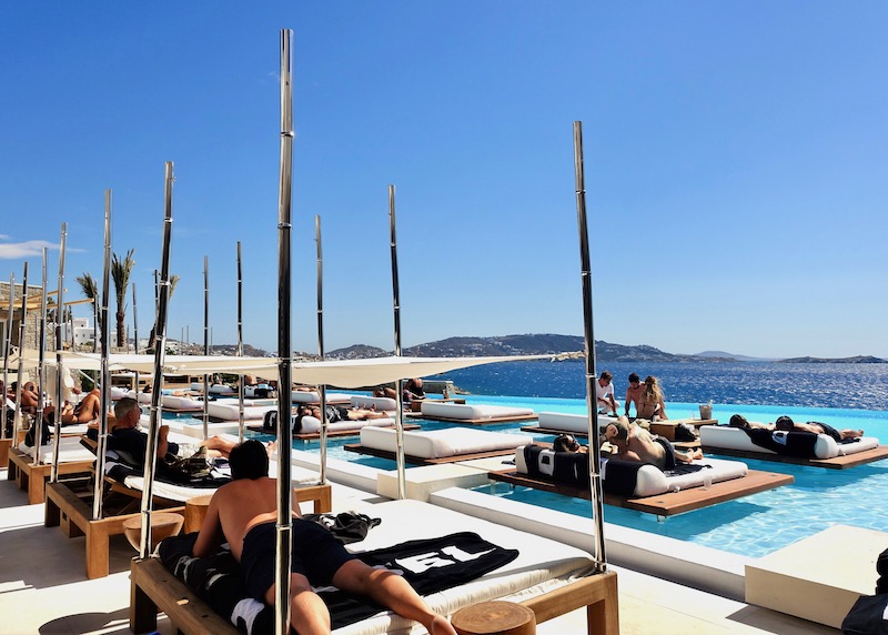 The main pool and sun deck at Cavo Tagoo in Mykonos Town