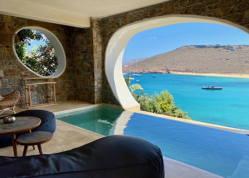 Private pool and view from a Deluxe Suite at Panormos Village on Panormos Beach in Mykonos