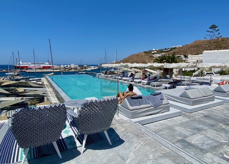 Pool and ferry port view at Mykonos Riviera in Tourlos, Mykonos