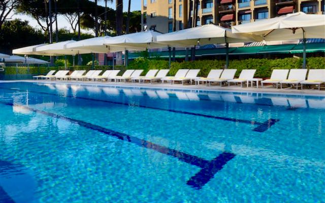 Luxury hotel with outdoor pool in Rome.