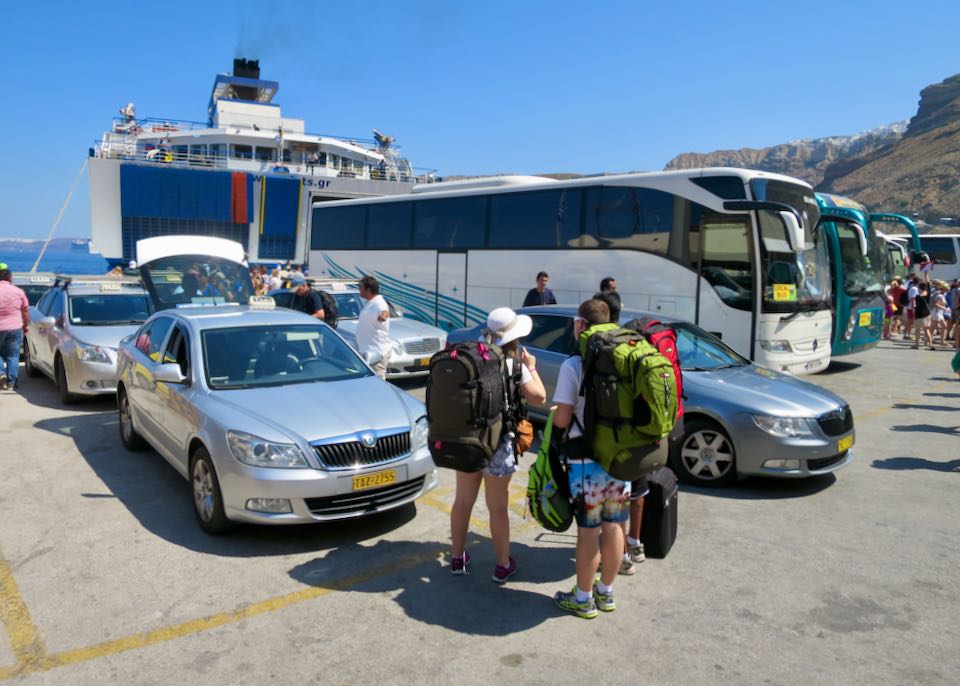 Buses and taxis at the Santorini ferry port.