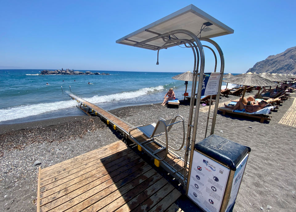 Mechanical lift to carry wheelchair users from the sand out into the sea