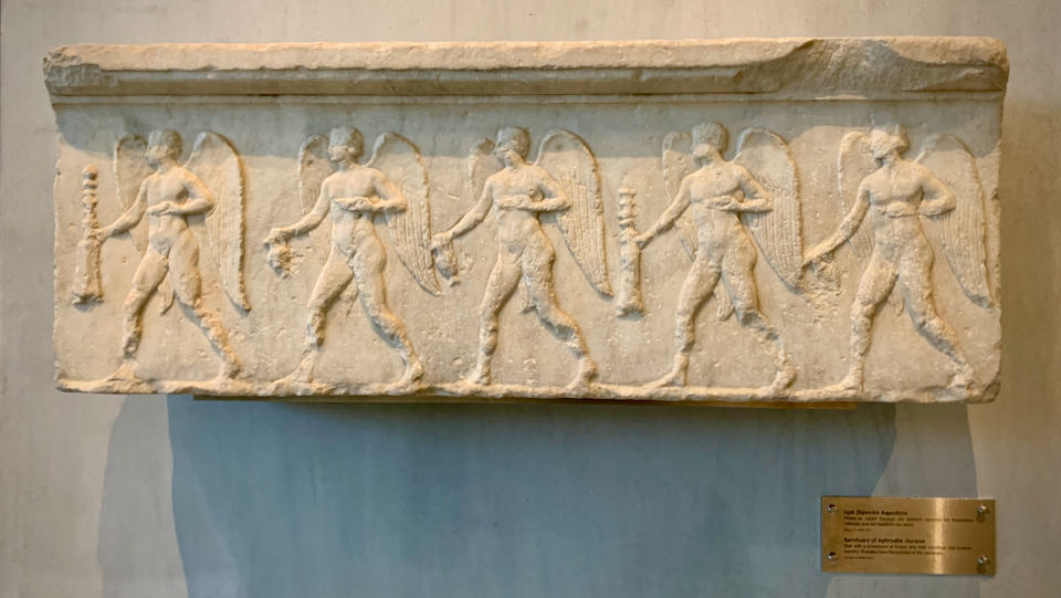 Marble frieze on display in a museum gallery