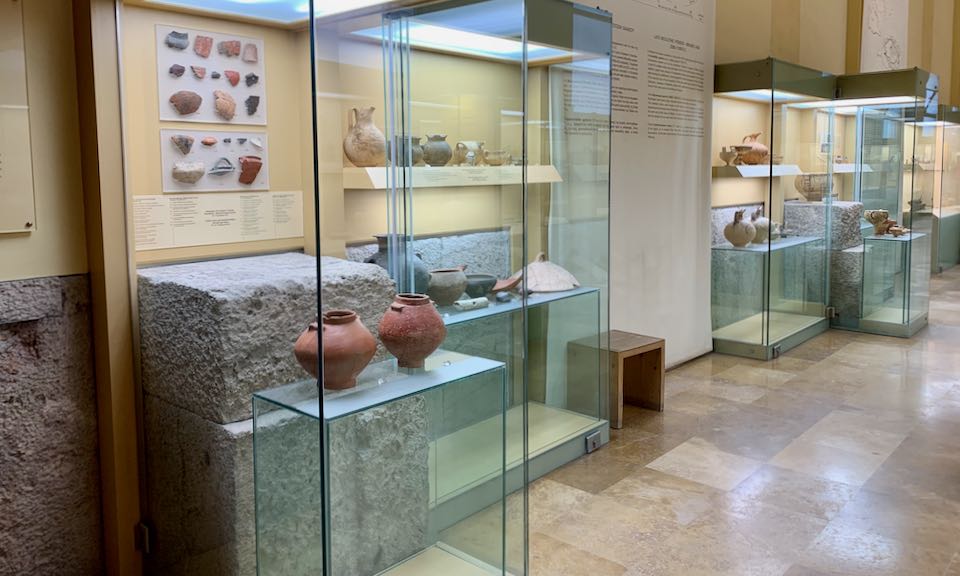 Ancient pottery in Museum display cases