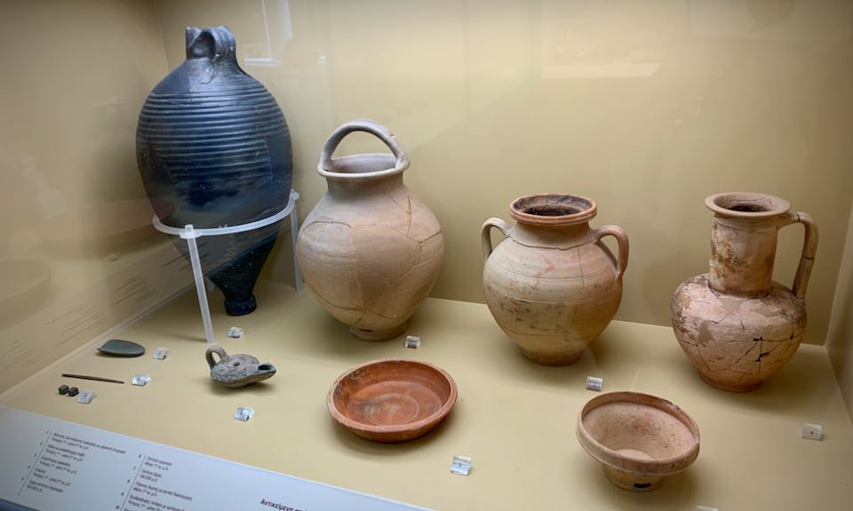 Earthenware vessels displayed in a museum