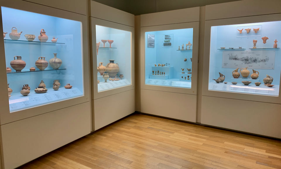Shelves of items on display in a museum