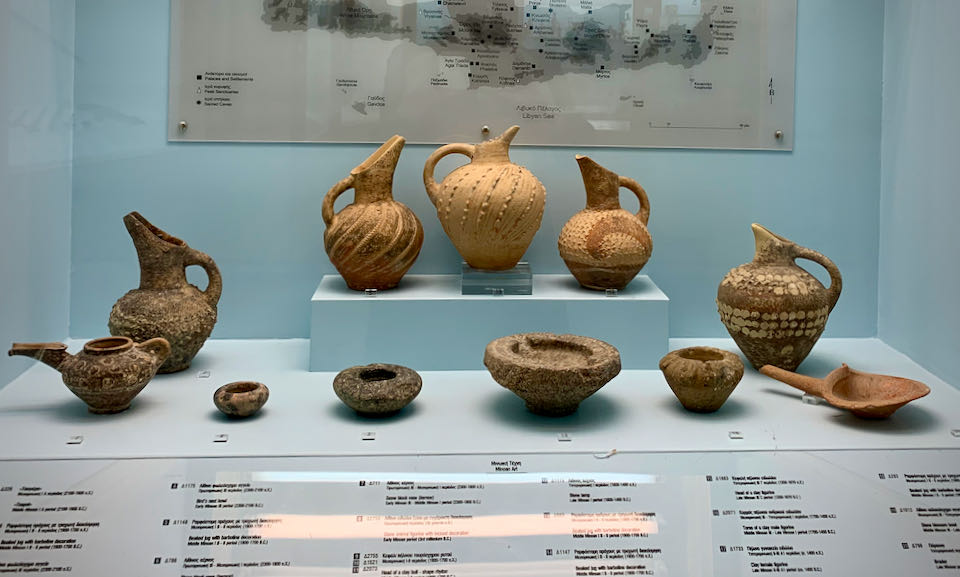 Clay vessels in a museum display case