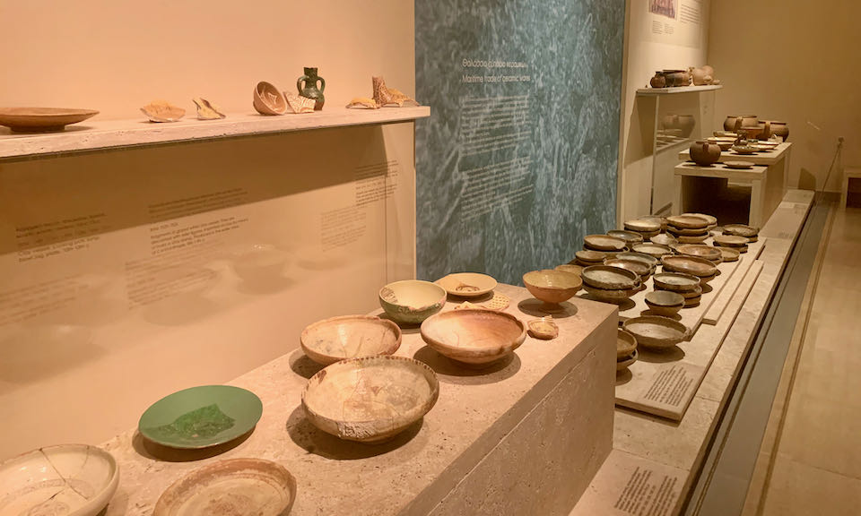 Clay bowls on display in a museum