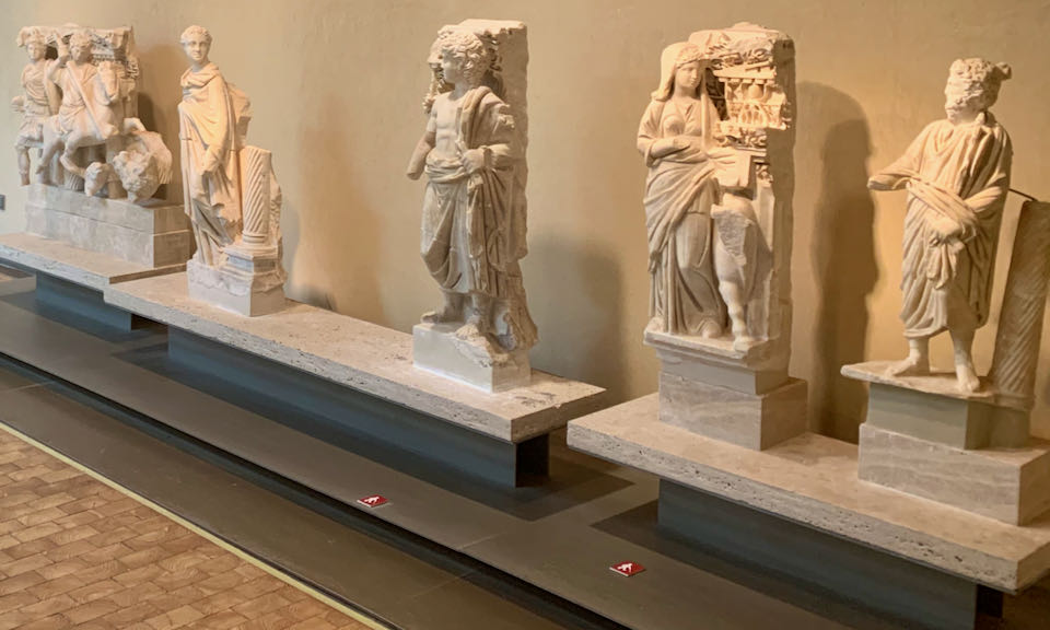 Marble statues displayed in a museum