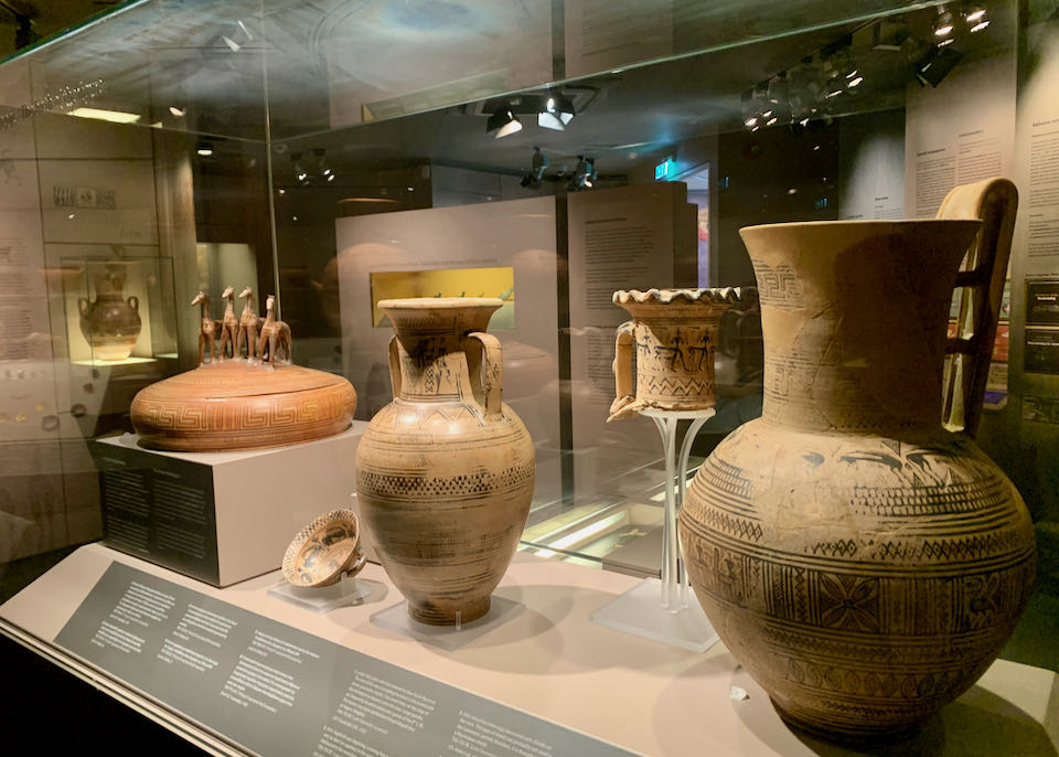 Early clay vessels in a museum display case