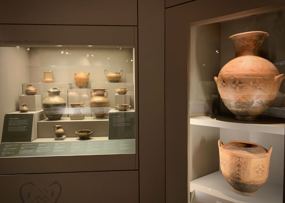 Clay vessels in a museum display case