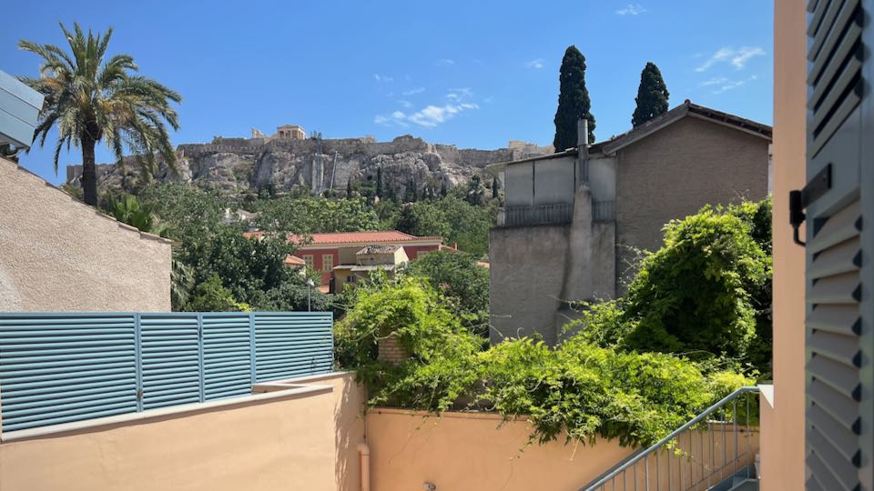 Beautiful view of the Athens Acropolis from a second floor balcony.