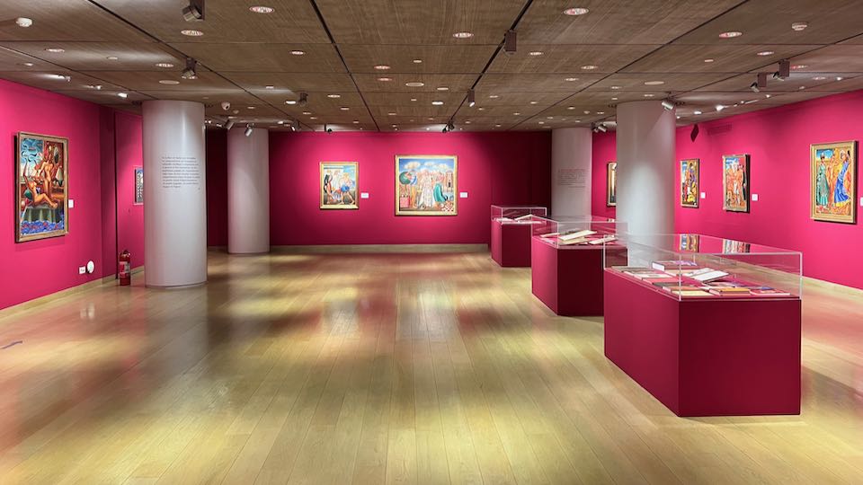 Large gallery room with fuschia walls