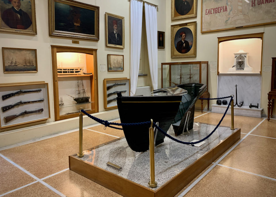 Part of a ship on display in a museum room