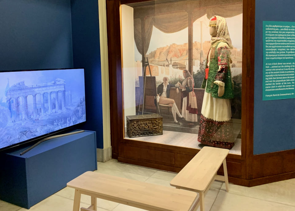 Diorama of an old Greek parlor next to a TV set for a doculentary viewing