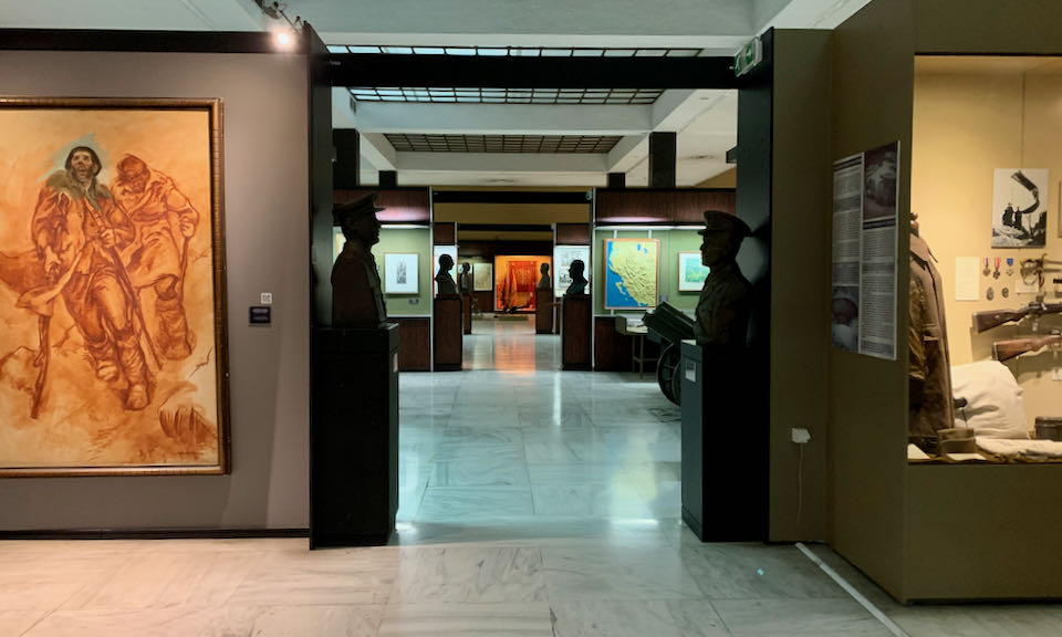 Museum corridor lined with busts of military figures