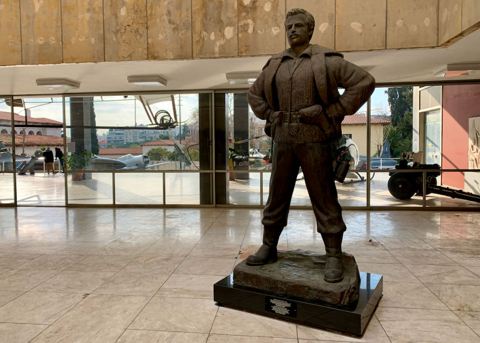 Statue of a Greek airman on display in a museum